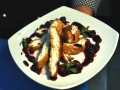 Куриное филе  в ореховой корочке под ягодно-коньячным соусом