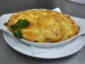 Филе белой рыбы, запеченное под сыром